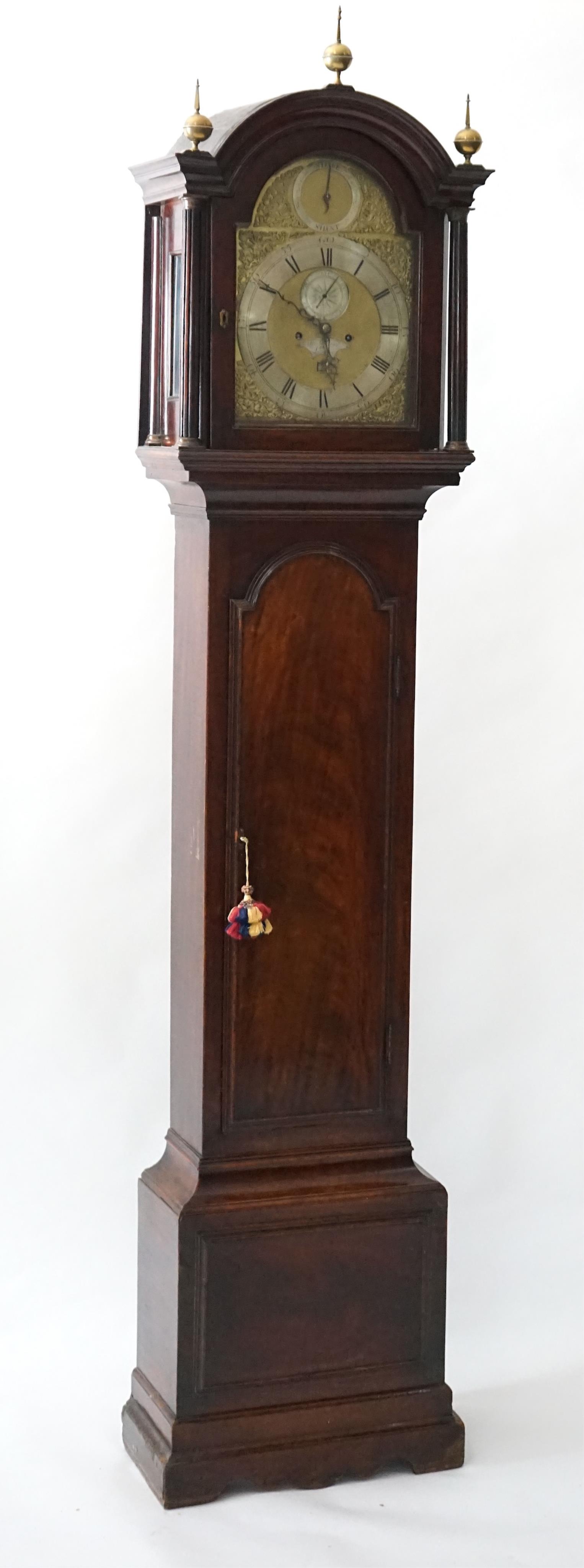 Thomas Garner of London, a George III mahogany eight day longcase clock, the arched brass dial with silvered strike / silent, Roman chapter ring, subsidiary seconds and date aperture, five pillar movement with anchor esc